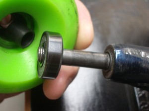 make sure the axel does not go into the center spacer...you will feel it